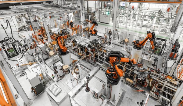 Automobile production line. Welding car body. Modern car assembly plant. Top view Automobile production line. Welding car body. Modern car assembly plant. Top view.